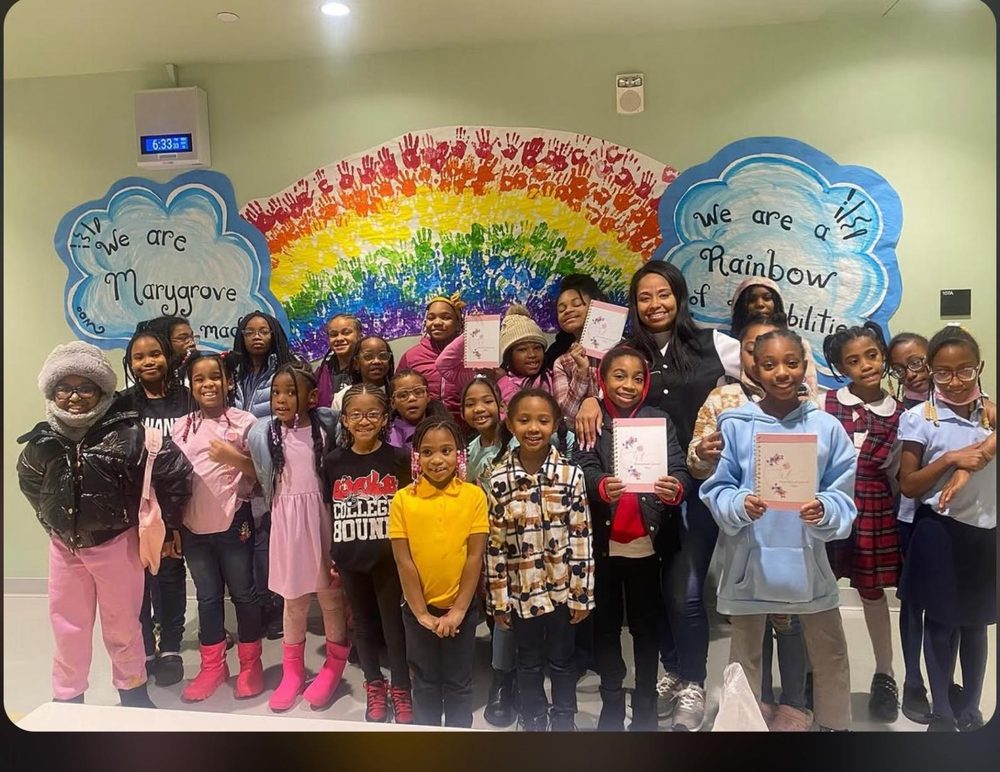 Tiera mentoring a group of girls